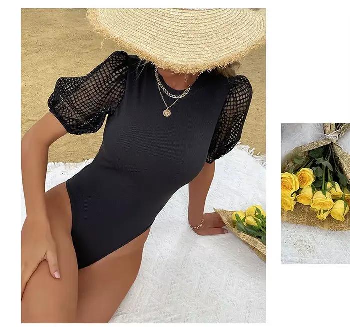Body côtelé noir avec manches bouffantes en maille transparente - Haut polyvalent pour l'été