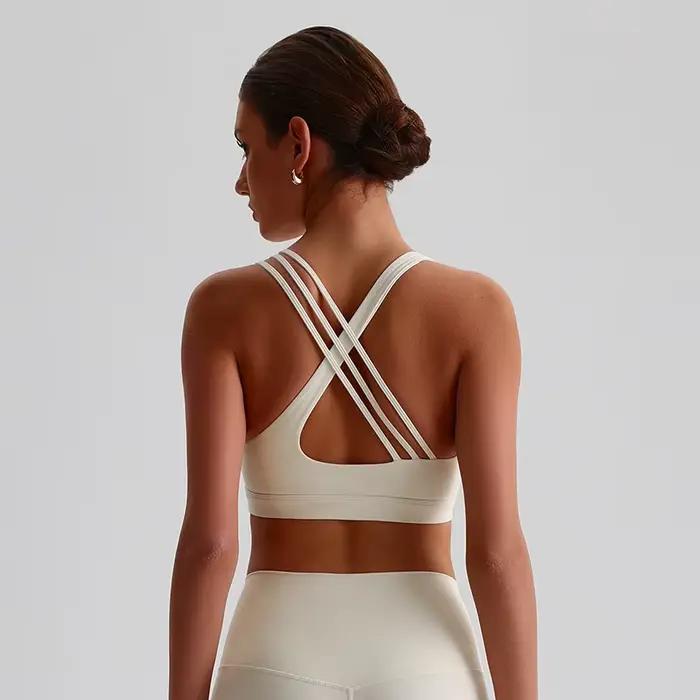 Soutien-gorge de Sport pour femmes, couleur unie, dos croisé, haute résistance, haut moulant, entraînement complet, sous-vêtements de Yoga avec coussinet de poitrine