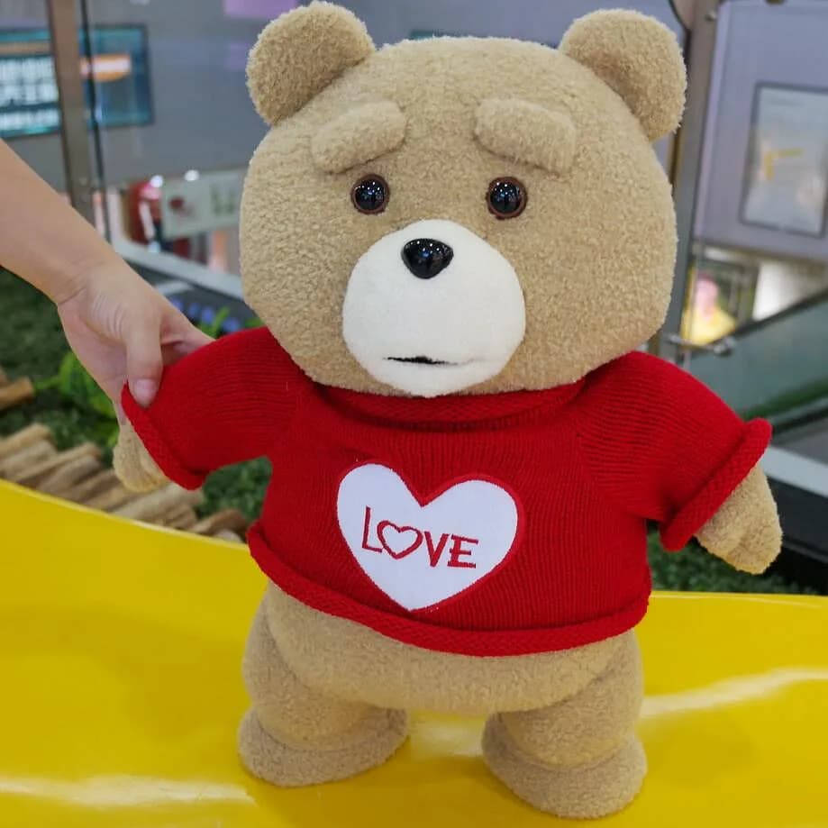 Peluche Teddy Bear Ted 2 de 43 cm, jouet en peluche doux avec tablier, idéal comme cadeau de Noël ou