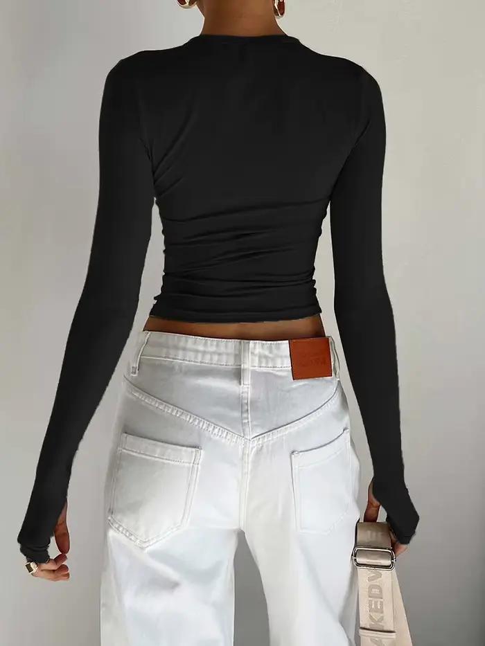 Mode femmes T-shirt à manches longues col rond solide coupe ajustée dames haut court avec trous pour