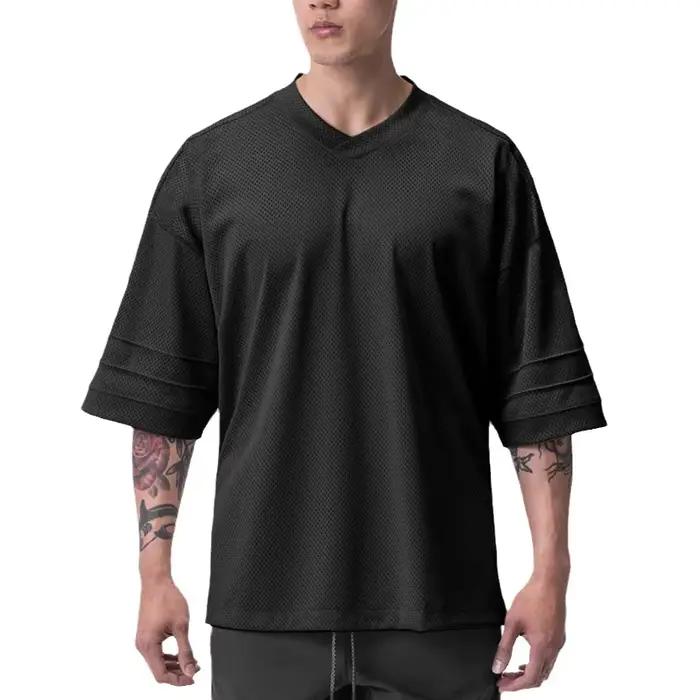 T-shirt de course oversize à épaules tombantes et col en V, manches courtes, en maille respirante po