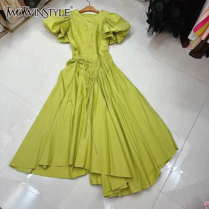 TWOTWINSTYLE tempérament robes solides pour les femmes col rond manches à bulles taille haute décont