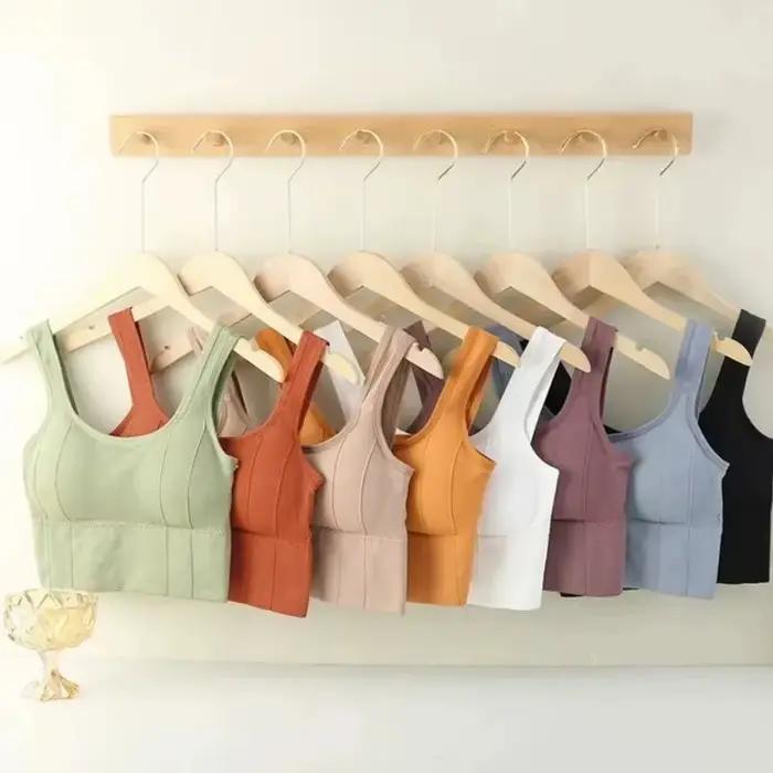 Soutien-gorge de sport avec fonction anti-transpiration pour vêtements de fitness. Soutien-gorge de yoga sans couture pour femme. Haut anti-choc à épaules dénudées.