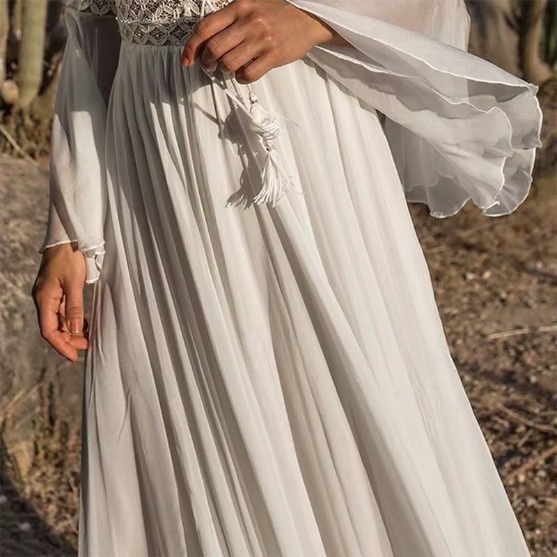 Femmes manches longues évasées col en V blanc creux Boho dentelle Maxi robe femme vacances Chic été