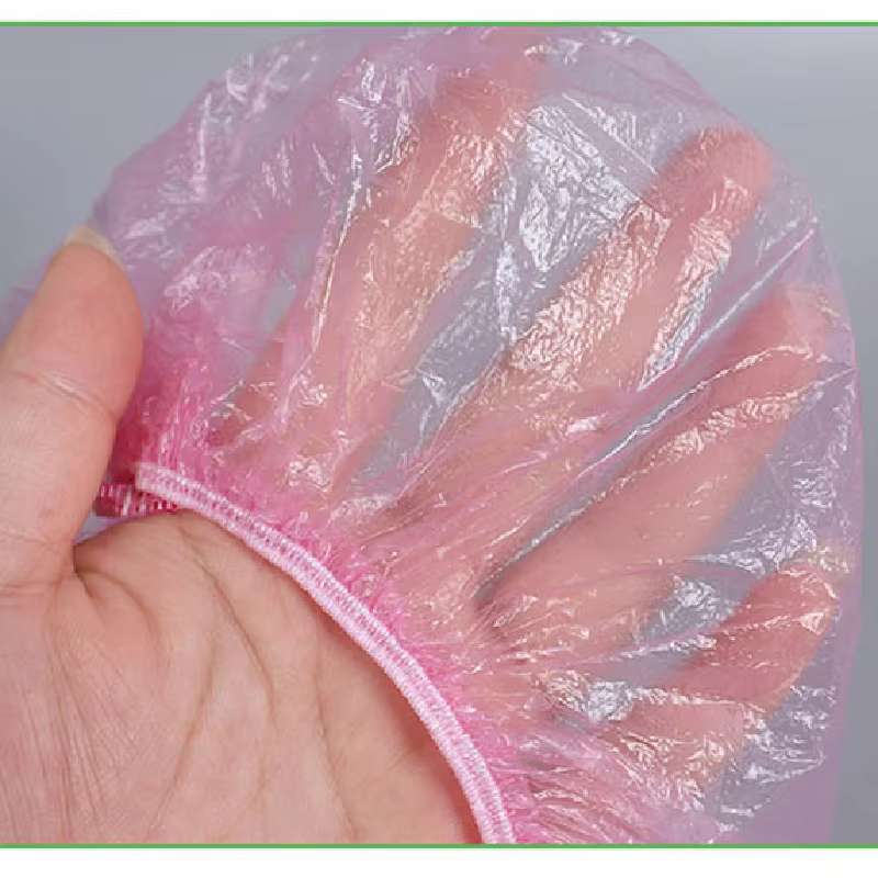 50/pièces/ensemble jetable en plastique douche bonnet de cheveux femmes imperméable rose Salon de Sp