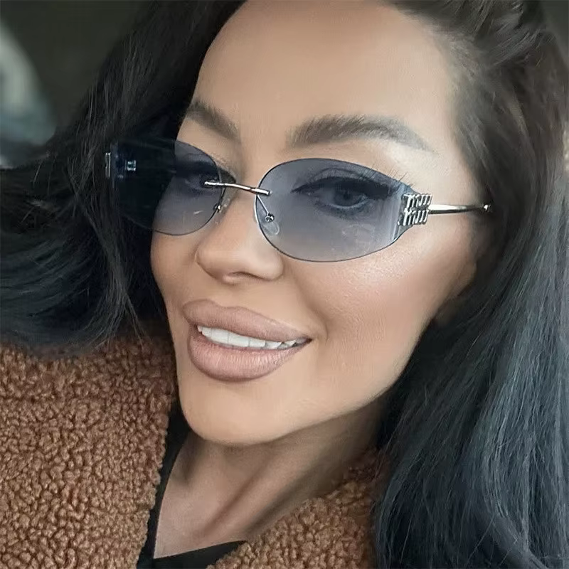 Lunettes de soleil ovales sans bords pour femmes, UV400, verres noirs dégradés surdimensionnés, mont