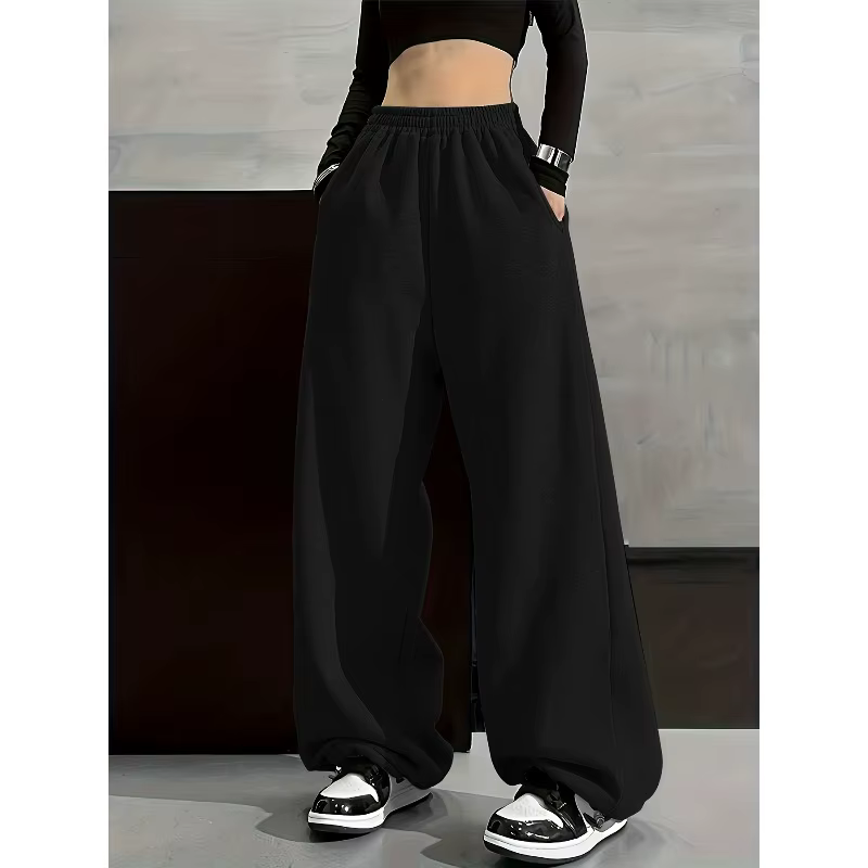 Pantalon à jambes larges confortable de couleur unie avec poche à taille élastique, coupe ample déco