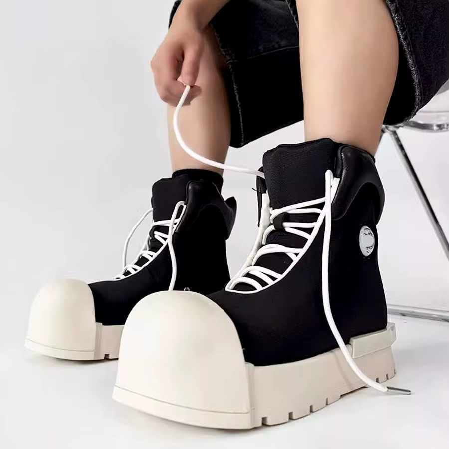 Niche Couple pain à la mode grande tête haut hommes et femmes plate-forme rehaussant bottes américai