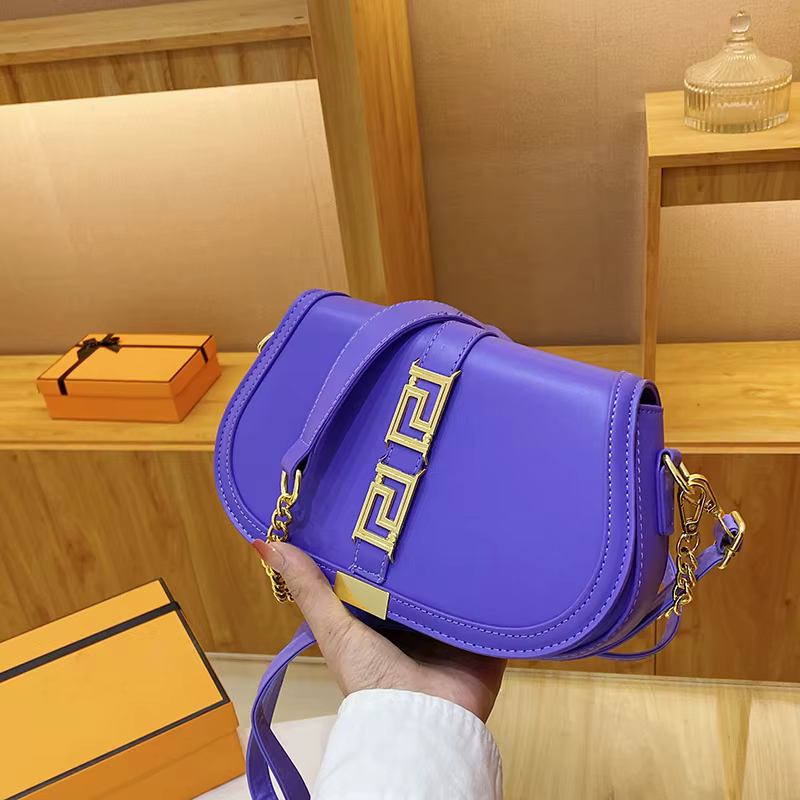 Sac à langer en cuir souple et tendance avec bandoulière réglable, réduit la fatigue lors du transpo