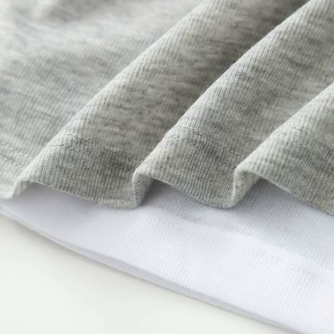 ETJ 2025 nouvelle mode femme couleur-blocage et patchwork faux deux pièces sexy épaules dénudées T-s