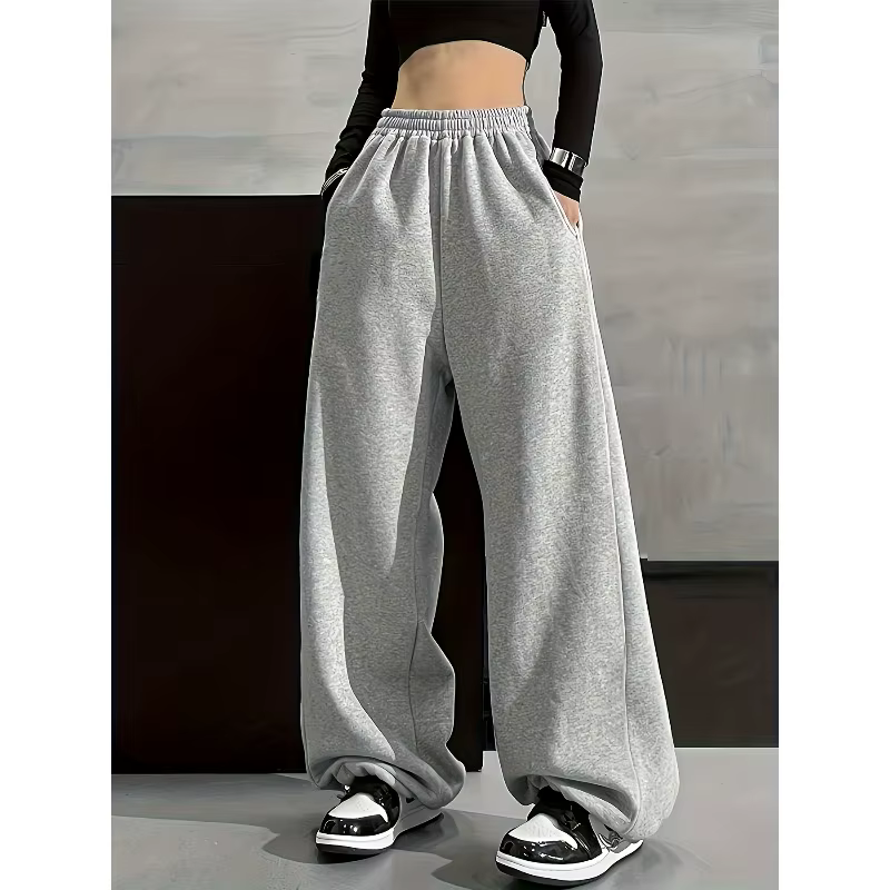 Pantalon à jambes larges confortable de couleur unie avec poche à taille élastique, coupe ample déco
