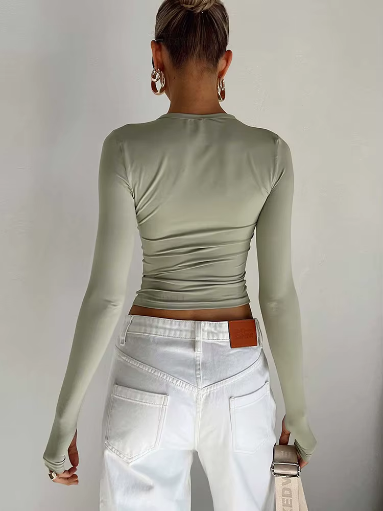 Mode femmes T-shirt à manches longues col rond solide coupe ajustée dames haut court avec trous pour