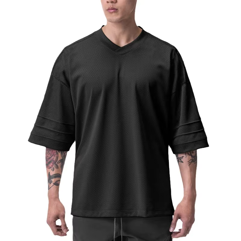 T-shirt de course oversize à épaules tombantes et col en V, manches courtes, en maille respirante po