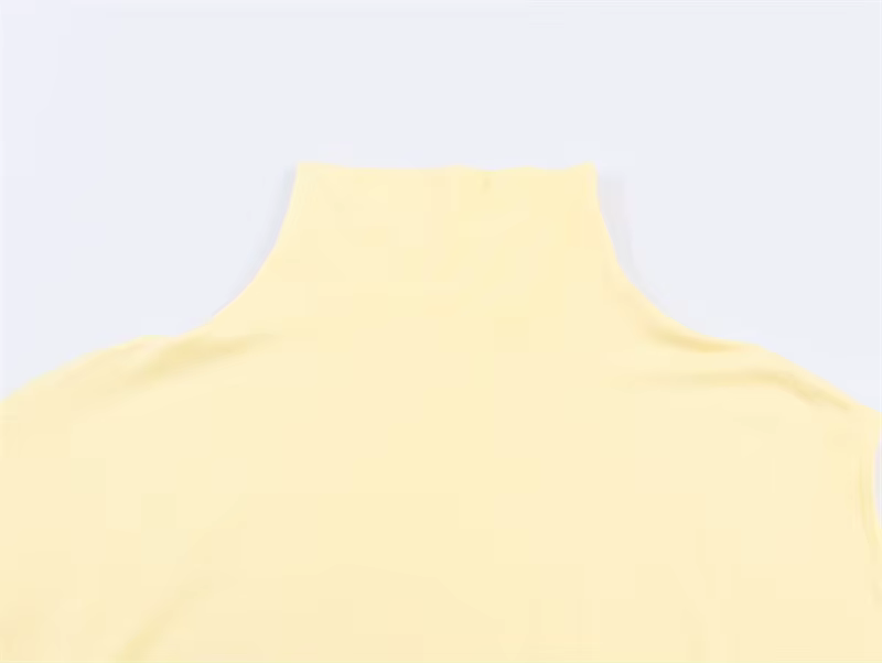 Haut asymétrique plissé décoratif jaune à col montant et manches courtes pour femme, nouvelle collec