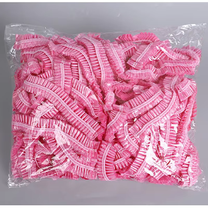 50/pièces/ensemble jetable en plastique douche bonnet de cheveux femmes imperméable rose Salon de Sp
