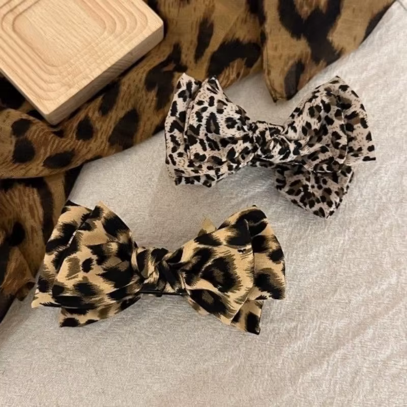 Pince à cheveux nœud imprimé léopard pour femme, style rétro, pour chignon ou queue de cheval haute,