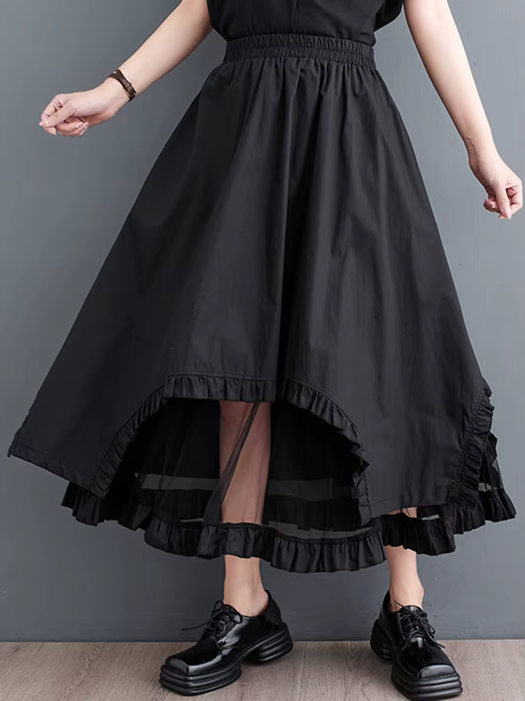 Jupe mi-longue décontractée noire vintage à empiècements en maille, taille haute, coupe irrégulière,