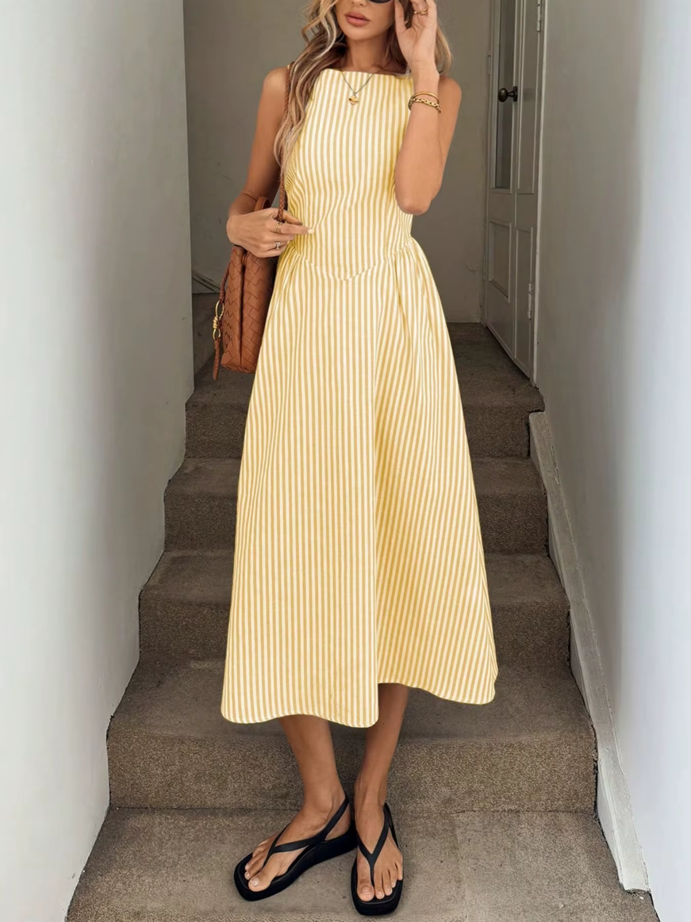 Robe d'été amincissante sans manches à rayures verticales, fraîche, tempérament élégant, nouvelle co
