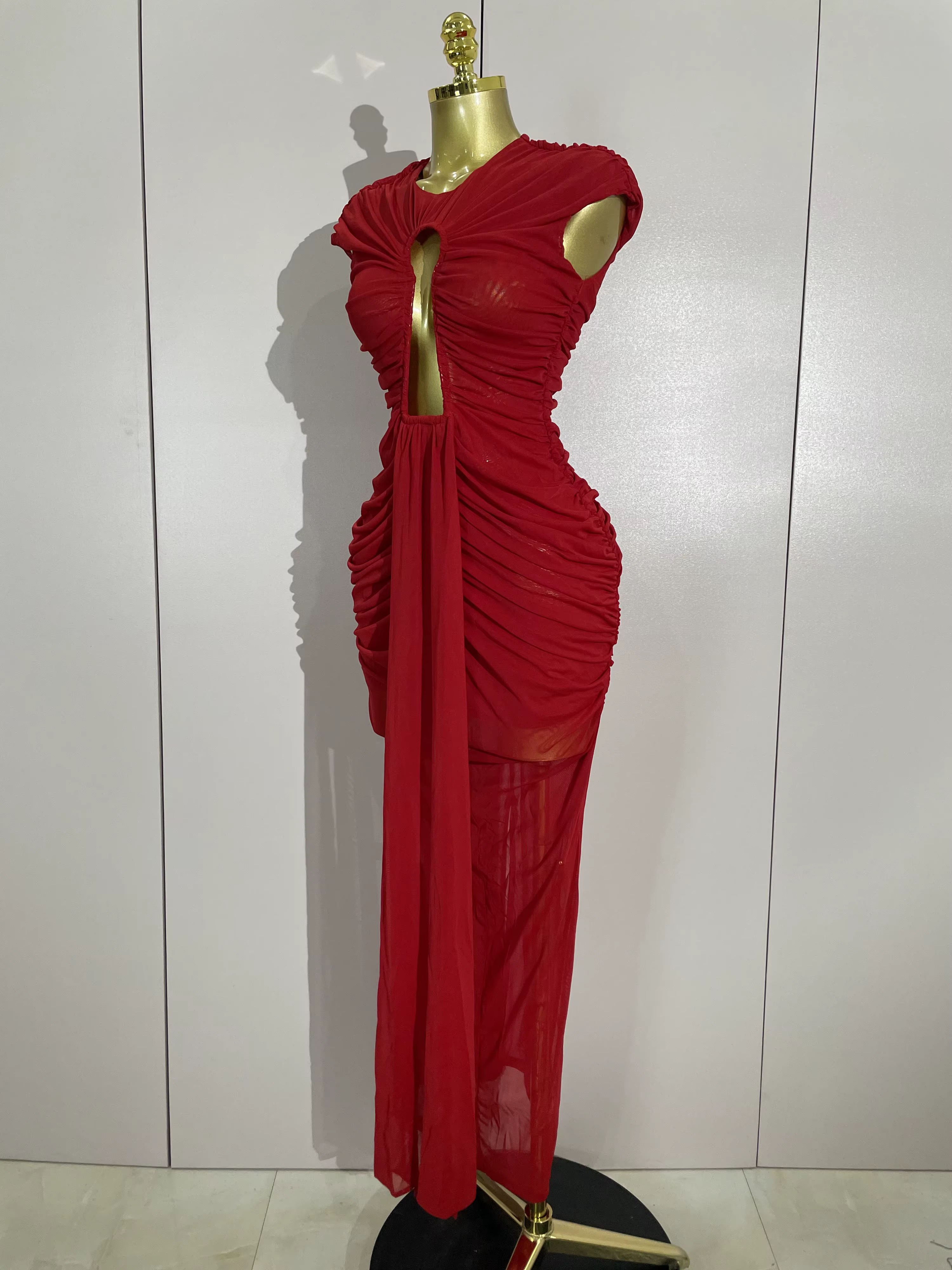 Femmes Sexy sans manches col rond évider maille moulante longue robe défilé de mode célébrer célébri