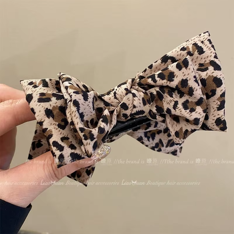 Pince à cheveux nœud imprimé léopard pour femme, style rétro, pour chignon ou queue de cheval haute,