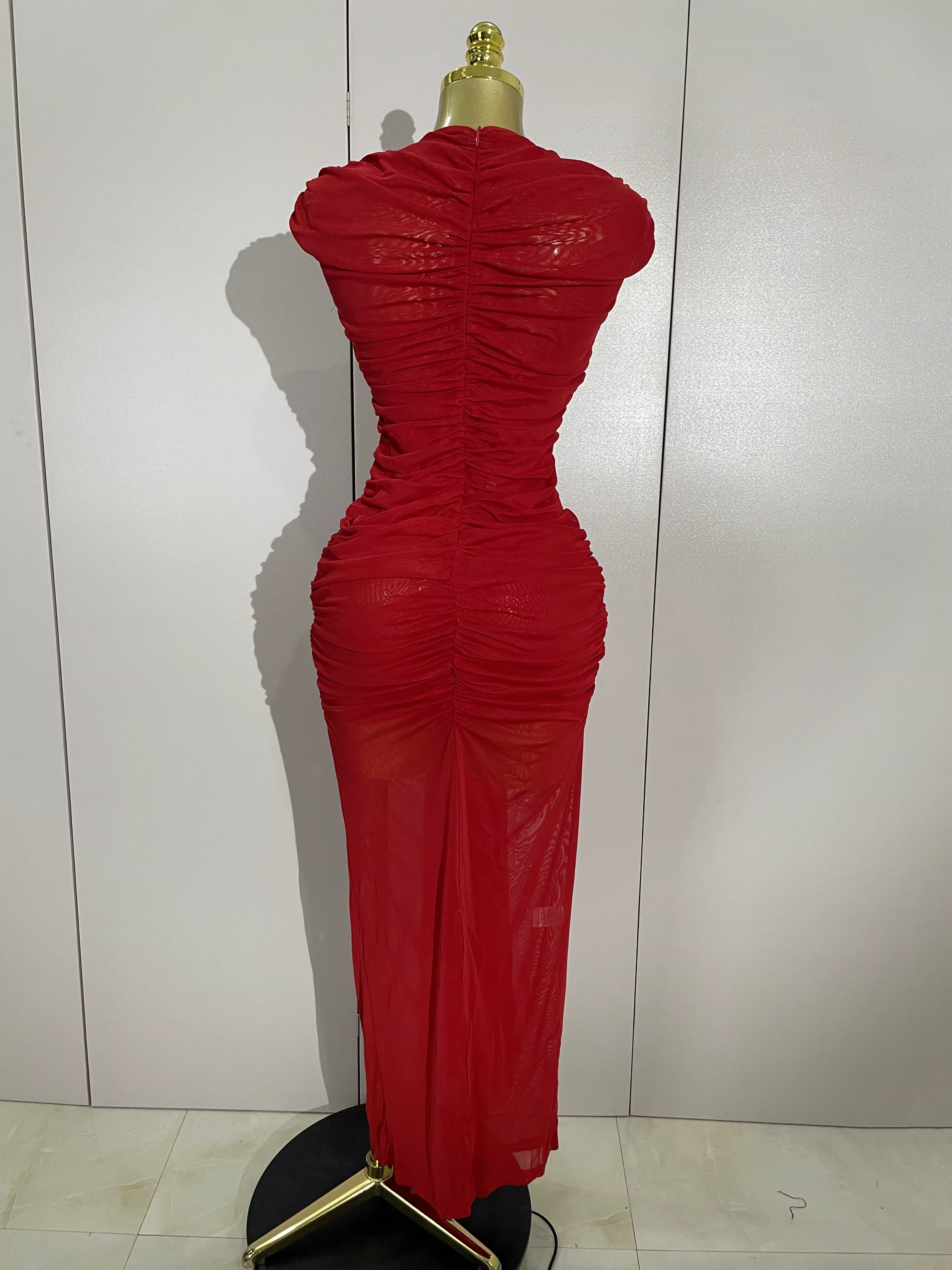 Femmes Sexy sans manches col rond évider maille moulante longue robe défilé de mode célébrer célébri
