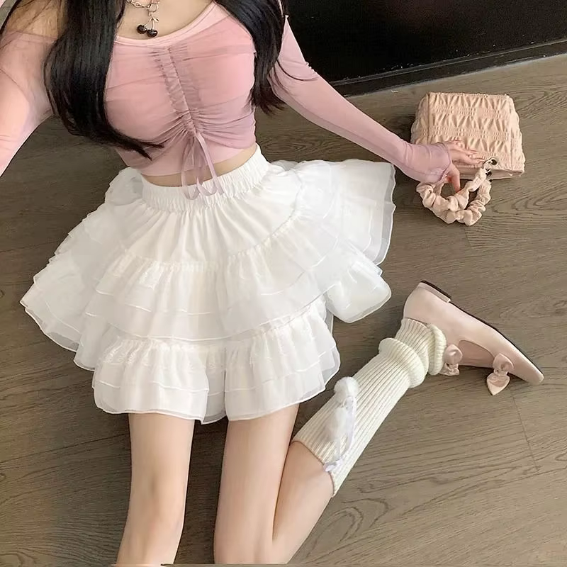 Nouveau dans les vêtements doux coréen décontracté été tendance blanc dentelle gâteau Mini jupe Ball