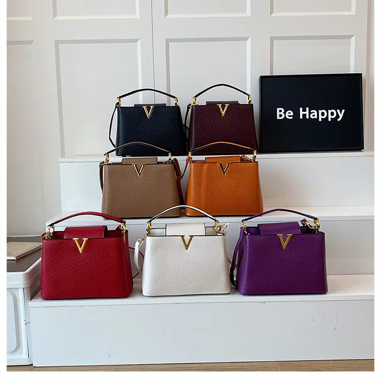 Sac à langer en cuir élégant et décontracté pour femme, grande capacité, texturé, inspiré des créate