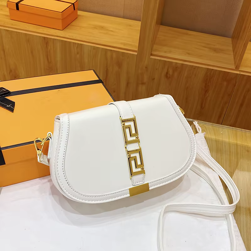 Sac à langer en cuir souple et tendance avec bandoulière réglable, réduit la fatigue lors du transpo